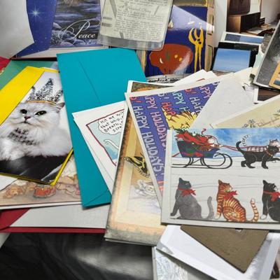 Sale Photo Thumbnail #27: Prohibito El Paso! Cook books, post cards, collection of unused vintage cat them Christmas cards, resin 1970 spoon holders with dried plants. Brochures, 1960's kids artwork. Classic wrapping paper sheets.1940s 1950s humorous cards, brochures.