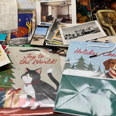 Sale Photo Thumbnail #26: Prohibito El Paso! Cook books, post cards, collection of unused vintage cat them Christmas cards, resin 1970 spoon holders with dried plants. Brochures, 1960's kids artwork. Classic wrapping paper sheets.1940s 1950s humorous cards, brochures.