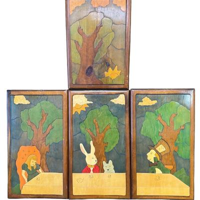 Sale Photo Thumbnail #428: This vintage piece is in four panels. It depicts a scene from the story, including Alice, The Mad Hatter, and other characters. This has great vintage patina. There are some minor cracks on the framing only, and a few areas of scratches on the puzzle piec