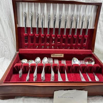 Sale Photo Thumbnail #39: Oneida Community Evening Star 77 piece set with serving pieces in good condition.  Very heavy with storage box , can be shipped.