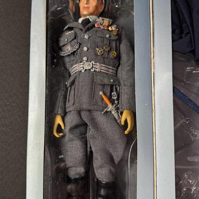 Sale Photo Thumbnail #434: Made by DiD Corporation. This is a 1/6 scale action figure. It may or may not be complete. Includes the original box, which has storage and/or use related wear. It has been in a smoky environment. [JS]