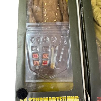 Sale Photo Thumbnail #439: Made by DiD Corporation. This action figure is 1/6 scale. It may or may not be complete. Includes the original box, which has storage and/or use related wear. It has been in a smoky environment. [JS]