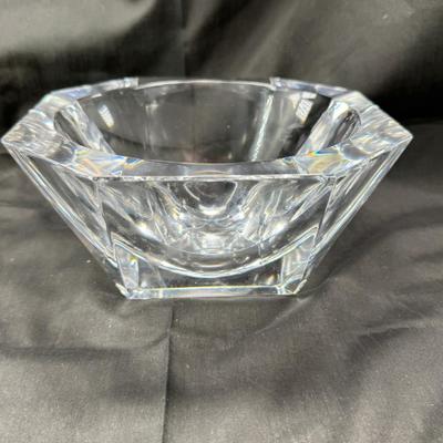 Sale Photo Thumbnail #75: Absolutely stunning Swedish crystal bowl signed and numbered by artist Lars Hellsten for Orrefors Crystal.  Large bowl could be used as a centerpiece or accent bowl.  Heavy lead crystal with deep cuts catches the light and shines perfectly.  It is elegant