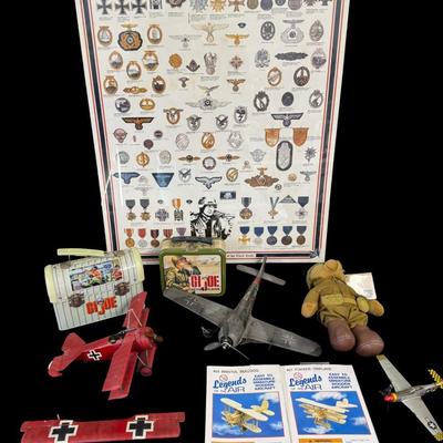 Sale Photo Thumbnail #466: Includes two metal GI Joe lunchboxes, two Legends of the Air wood models (NOS), three model planes, a poster, and more. Total of nine pieces. The planes need repair and/or have missing pieces. [JS]