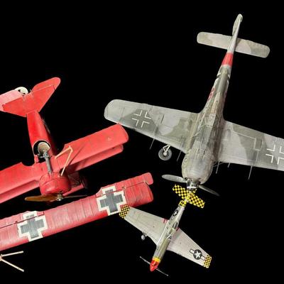 Sale Photo Thumbnail #468: Includes two metal GI Joe lunchboxes, two Legends of the Air wood models (NOS), three model planes, a poster, and more. Total of nine pieces. The planes need repair and/or have missing pieces. [JS]