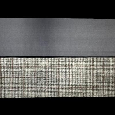 Sale Photo Thumbnail #471: This is a two-piece washable rug system, comprised of a rug cover and rug pad. It has a built-in waterproof barrier. It is stain resistant, water resistant, and machine washable. Glen Plaid pattern. Age related wear. Measurement: 120”L x 30”W. [RS]