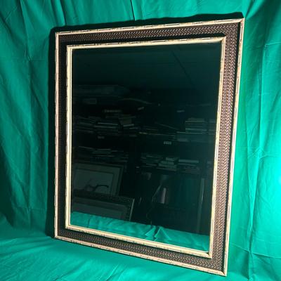 Sale Photo Thumbnail #124: Rectangular wall mirror featuring a decorative frame with an inner section showcasing a painted or gilded design. The outer edge is textured with an intricate bamboo-inspired motif. The mirror is set within a reflective glass surface and is suitable for h