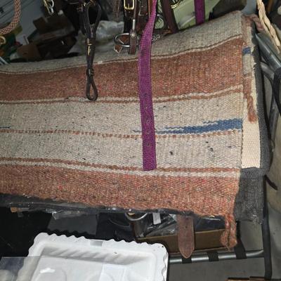 Saddle blankets and pads