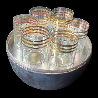 Sale Photo Thumbnail #505: This is a metal pear mini bar with leaf tray and shot glasses. Measurement: 6”H. Pre-auction estimate: $75-$125. [RE]