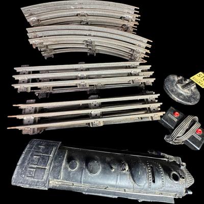 Sale Photo Thumbnail #520: Includes track, cars, locomotive parts, transformer, signal light, and more. Total of 25+ pieces. Not tested. [SR]