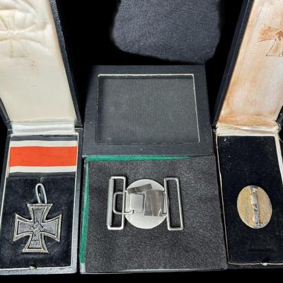 Sale Photo Thumbnail #548: Includes a WW2 German Silver Grade Wound Badge, an Iron Cross pendant, and a Waffen-SS officer’s belt buckle. Total of three pieces. [JS]