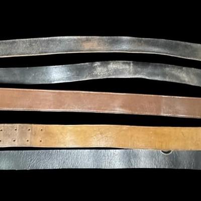 Sale Photo Thumbnail #549: Total of five leather belts with buckles. One belt has a Nazi buckle, which may or may not be original. Age related wear. [JS]