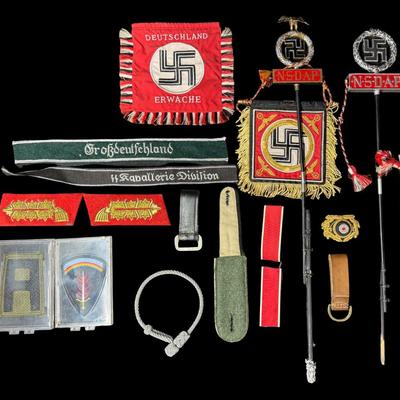 Sale Photo Thumbnail #555: Includes regimental flags, patches, a hat badge, shoulder boards, and more. Total of 15+ pieces. Some pieces may be reproductions. Measurement of largest flag: 6.5” x 5.5”. [JS]
