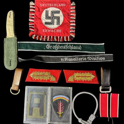 Sale Photo Thumbnail #556: Includes regimental flags, patches, a hat badge, shoulder boards, and more. Total of 15+ pieces. Some pieces may be reproductions. Measurement of largest flag: 6.5” x 5.5”. [JS]