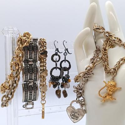 LOT 152: Vintage Gold-Tone Kellogg's Charm Bracelet, Aero Charm Bracelet, Monet Bracelet & More