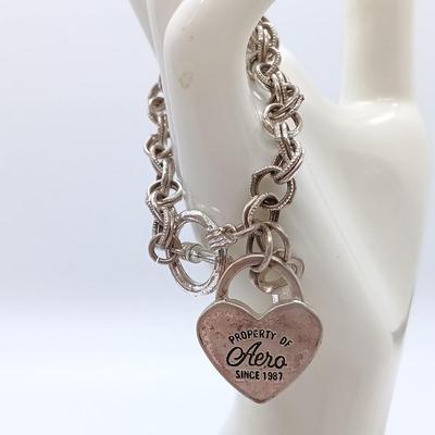 LOT 152: Vintage Gold-Tone Kellogg's Charm Bracelet, Aero Charm Bracelet, Monet Bracelet & More