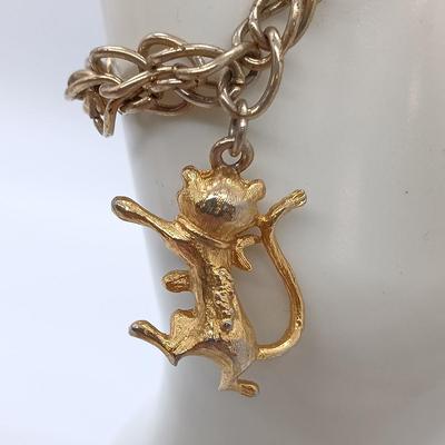 LOT 152: Vintage Gold-Tone Kellogg's Charm Bracelet, Aero Charm Bracelet, Monet Bracelet & More