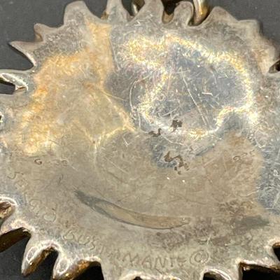 Sergio Bustamante signed sun pendant on a v shaped necklace