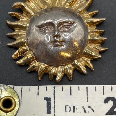 Sergio Bustamante signed sun pendant on a v shaped necklace
