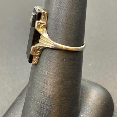 Black onyx and diamond ring