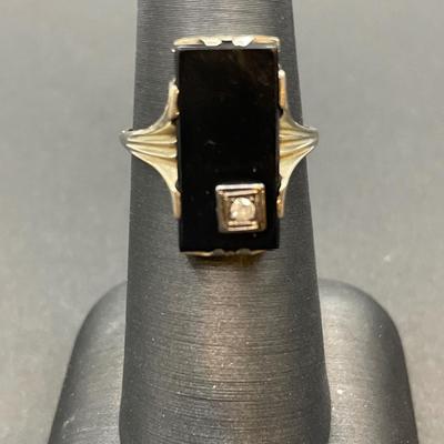 Black onyx and diamond ring