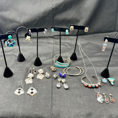 Sale Photo Thumbnail #147: Real stone cuff bracelets are not marked and do not test as Sterling. Pierced earrings many with latch back. Many marked 925 Silver. I have tried to show all markings.