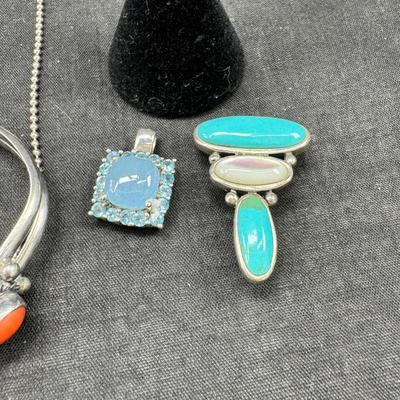 Sale Photo Thumbnail #149: Real stone cuff bracelets are not marked and do not test as Sterling. Pierced earrings many with latch back. Many marked 925 Silver. I have tried to show all markings.