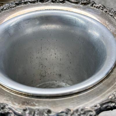 Sale Photo Thumbnail #176: 4 heavy candle sticks ( no markings) Gorham clam shell, Ice bucket, Shelffield England Pitcher and aluminim hammered plate Japan.