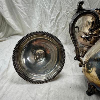 Sale Photo Thumbnail #179: 4 heavy candle sticks ( no markings) Gorham clam shell, Ice bucket, Shelffield England Pitcher and aluminim hammered plate Japan.
