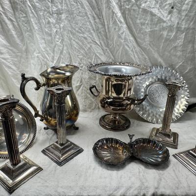 Sale Photo Thumbnail #171: 4 heavy candle sticks ( no markings) Gorham clam shell, Ice bucket, Shelffield England Pitcher and aluminim hammered plate Japan.