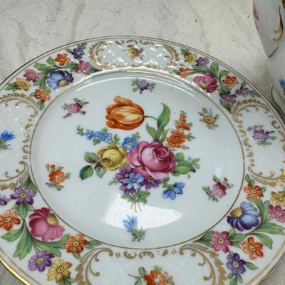 Sale Photo Thumbnail #212: Set of floral Hors d'oeuvre spoons, forks in original red case. Divided olive glass bowl with silver foot ( unmarked) 2 fine bone china tea pots one with matching plate.