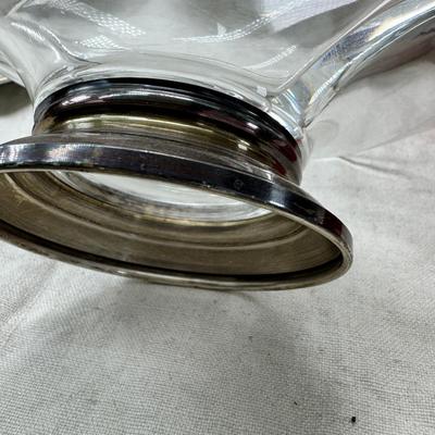 Sale Photo Thumbnail #206: Set of floral Hors d'oeuvre spoons, forks in original red case. Divided olive glass bowl with silver foot ( unmarked) 2 fine bone china tea pots one with matching plate.