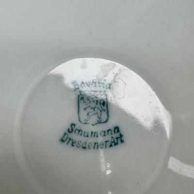 Sale Photo Thumbnail #213: Set of floral Hors d'oeuvre spoons, forks in original red case. Divided olive glass bowl with silver foot ( unmarked) 2 fine bone china tea pots one with matching plate.