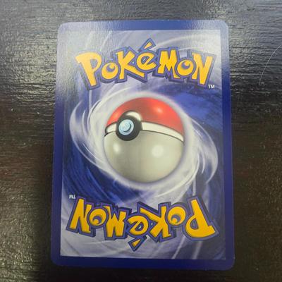 Sale Photo Thumbnail #12: First Edition Aerodactyl Pokemon card from the 1999 Fossil set. Features 60 HP and the attacks Prehistoric Power and Wing Attack. Includes the First Edition stamp on the cardâ€™s lower-left area. Card has standard layout with 1999-2000 Wizard of the 