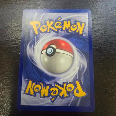 Sale Photo Thumbnail #22: Pokemon trading card featuring Clefairy, designated as card 5/102 from the Base Set. This card has 40 HP and features the moves Sing and Metronome. Copyrighted by Nintendo, Game Freak, and Wizards in 1999. The cardâ€™s front shows holographic detaili