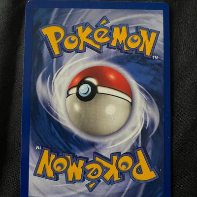 Sale Photo Thumbnail #42: Clefable 1st Edition holographic card from the PokÃ©mon Jungle set (#1/64). Features yellow borders and 70 HP. Condition is noted as light play, with minor surface wear consistent with handling. The reverse displays the PokÃ©mon logo and PokÃ© Ball 