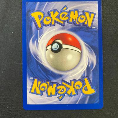 Sale Photo Thumbnail #48: Pokemon Fossil Ditto card with 50 HP, marked as card 18/62 from the Fossil series. The card has a yellow-bordered design and showcases the Transform ability. Condition noted as light play, with minor wear visible on both the front and back surfaces. No ma