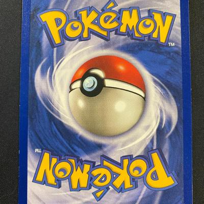 Sale Photo Thumbnail #56: Pokemon Trading Card Game card featuring Electrode from the Base Set. Card number 2/102, with 90 HP, holographic finish. Shows moderate signs of light play condition. Released in 1999 by Wizards of the Coast. Features attack moves Tackle and Chain Lightni