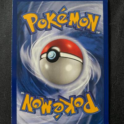 Sale Photo Thumbnail #62: Pokemon Fossil Gyarados holographic card, identified as card No. 6/62 from the Fossil expansion set printed by Wizards of the Coast. Displays 'light play' condition with minor signs of handling on the front and back of the card. Features the holographic f