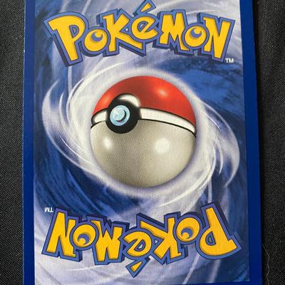 Sale Photo Thumbnail #66: This listing is for a Pokemon Gyarados 6/102 holofoil card from the original Base Set. The card features a holographic image with a light play condition. It has 100 HP and includes the Dragon Rage and Bubblebeam attacks. This card displays the trademark W
