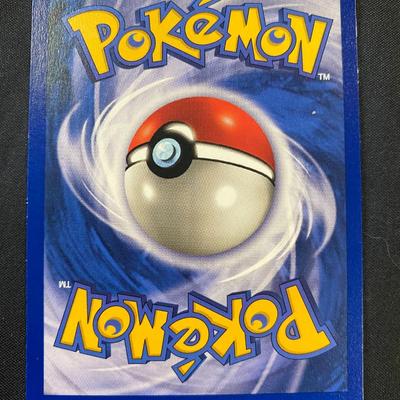 Sale Photo Thumbnail #134: This is a first edition holographic Gyarados from the Pokemon Trading Card Game series (Base Set, 1999). Card number is 6/102, published by Wizards of the Coast. Condition is noted as light play, with minor signs of handling typical for this grade. Featur