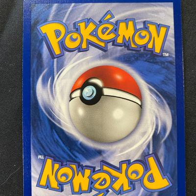 Sale Photo Thumbnail #136: Pokemon First Edition Holo card featuring Garados. German print with card number 6/102 from the Base Set. Condition is light play, with minimal wear visible on the front and back. Features include holographic foil on the Garados artwork. A sought-after co