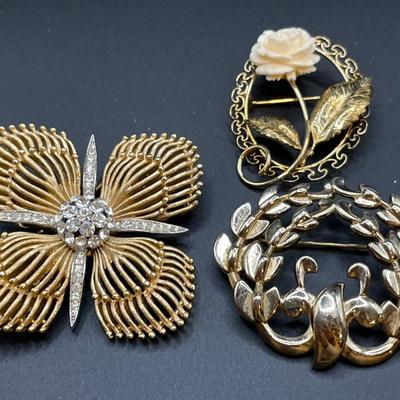 Beau Sterling rose pin, Trifari gold “Maltese” sparkling stone brooch & Monet pin