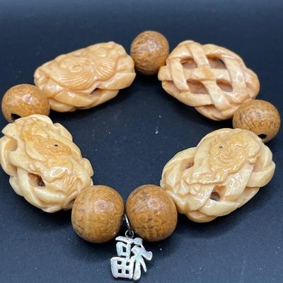 Red Cinnabar and Asian carved bracelet