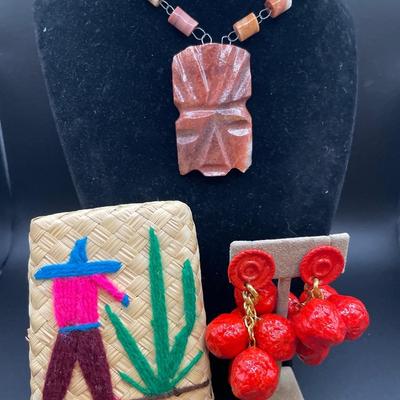 Mexican case with clip on earrings and carved stone necklace