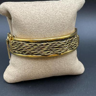 White and gold tone hinge bracelets