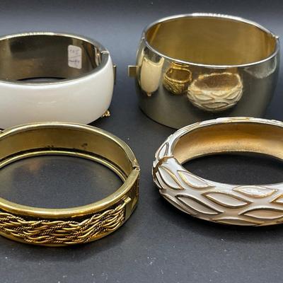 White and gold tone hinge bracelets