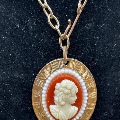 Vintage cameo and large clip on earrings