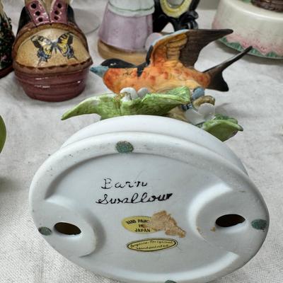 Sale Photo Thumbnail #228: Purple bohemian glass vase with small chip in rim, Resin camel 4 working music boxes, 1 Christmas snow globe.