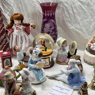 Sale Photo Thumbnail #236: Purple bohemian glass vase with small chip in rim, Resin camel 4 working music boxes, 1 Christmas snow globe.